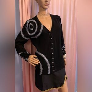Cardigan sweater with sequins and stunning statement buttons up the front